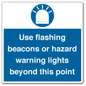 Use flashing beacons or hazard warning lights beyond this point